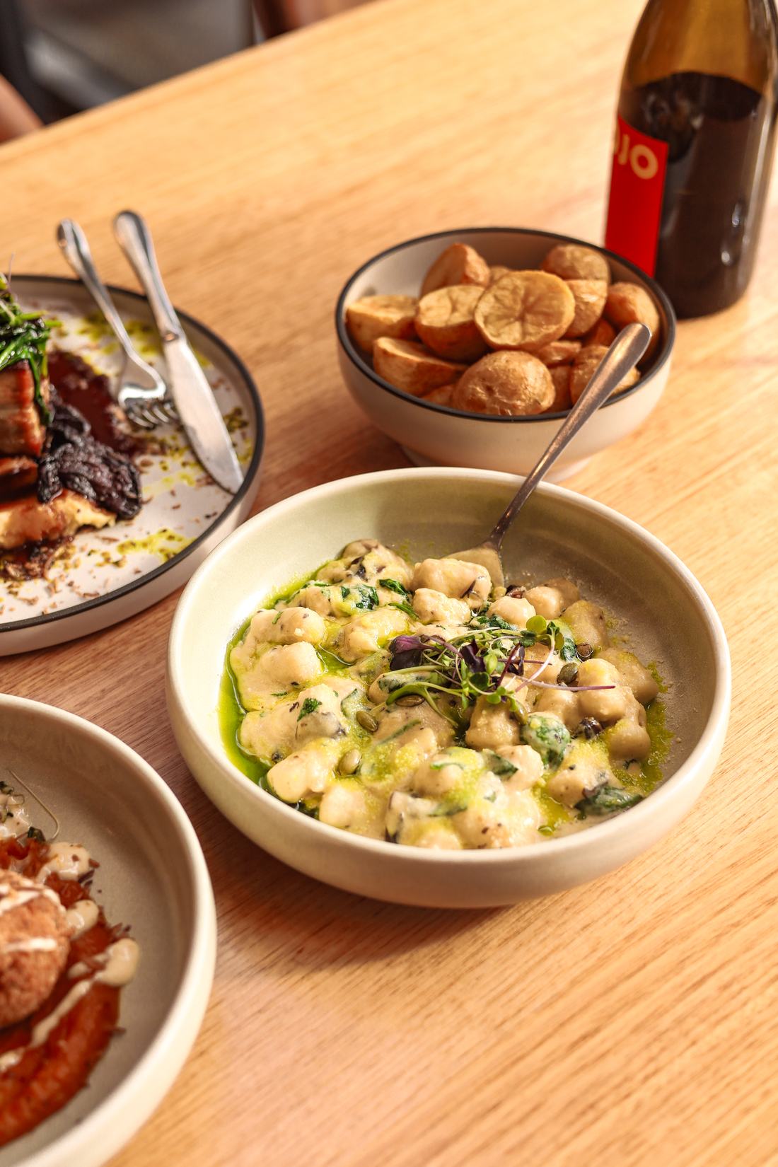 Hand made gnocchi with wild mushroom and garlic cream