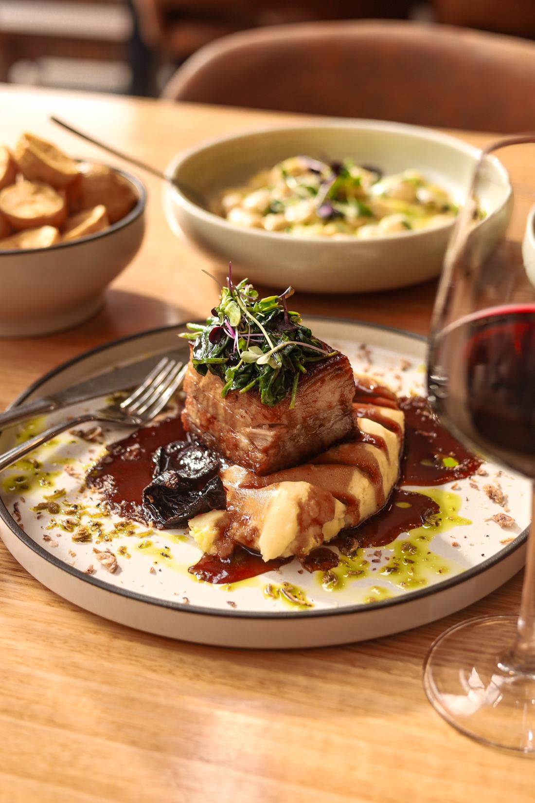 Crispy Kingaroy pork belly with pumpkin cream