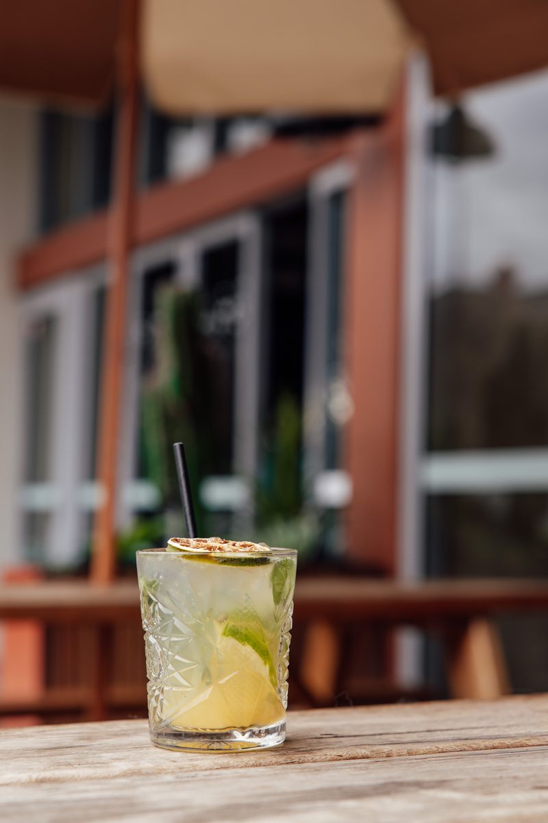 A cocktail poured over ice at the bar at The Rock Toowoomba